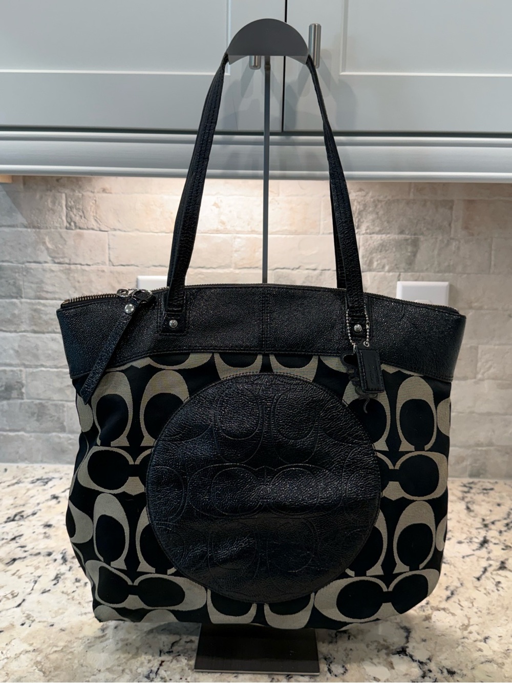Coach EUC Black & Tan Signature Circle Patch Tote